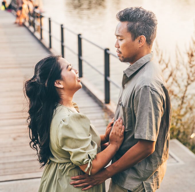 romantic-couple-on-a-lakeside-pier-at-sunset-2025-07-09-06-56-23-utc.jpg